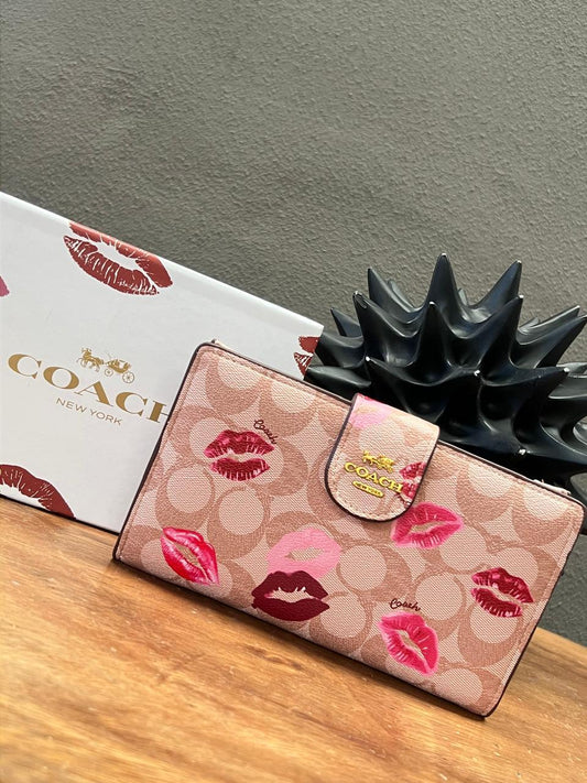 CARTERA COACH DE DAMA BESOS MAQUILLAJE