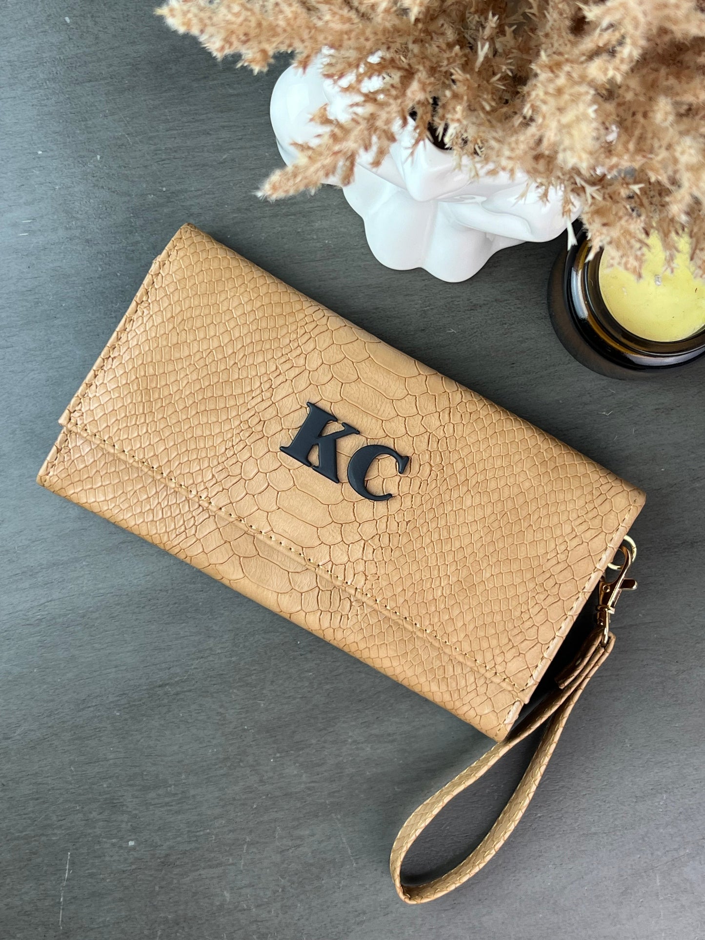 CARTERA MUÑEQUERA CAMEL PITON