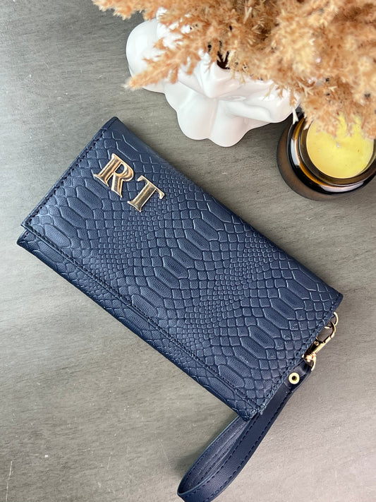 CARTERA MUÑEQUERA  AZUL MARINO
