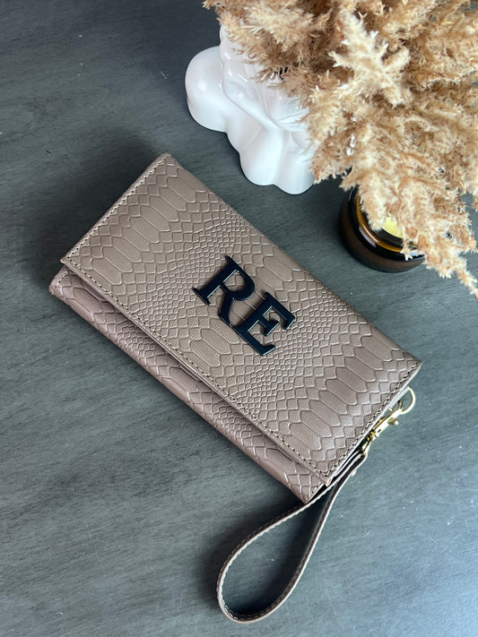 CARTERA MUÑEQUERA BAILEYS