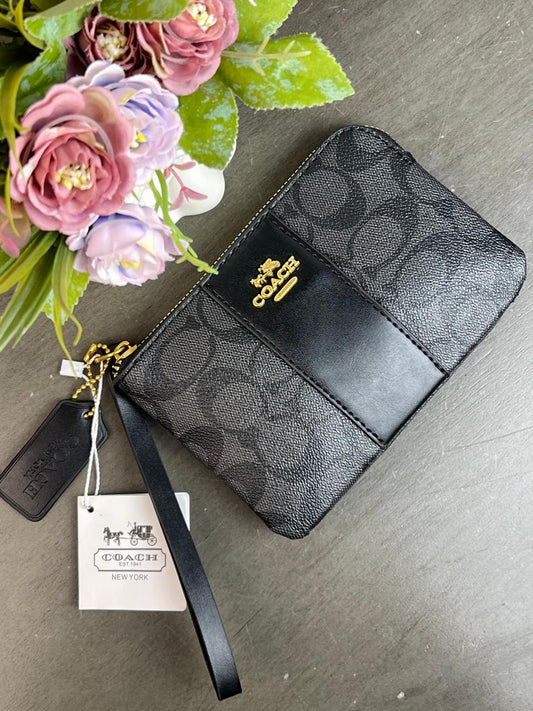 MUÑEQUERA COACH NEGRO  ESTAMPADO FRANJA LISA