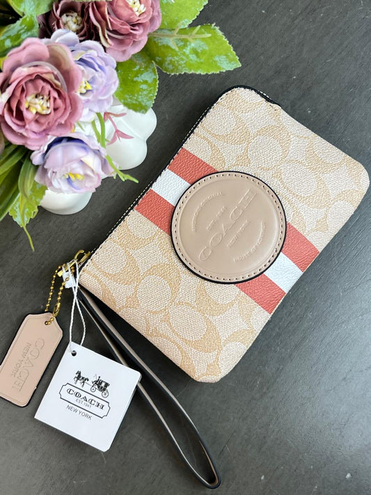 MUÑEQUERA COACH BEIGE FRANJAS BLANCO