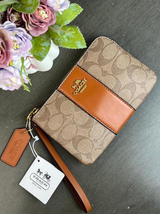 MUÑEQUERA COACH KHAKI FRANJA CAMEL