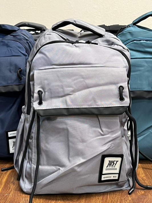 MOCHILA JUST GRIS