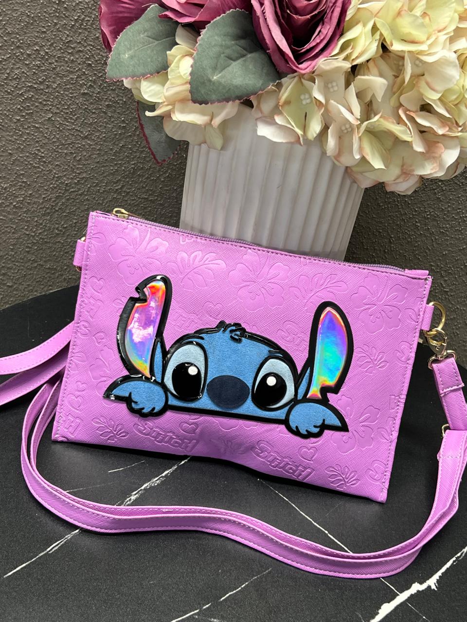 CROSSBODY/MUÑEQUERA DISNEY STITCH LILA