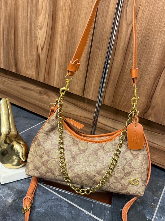 BAGUETTE COACH 2.0 TANG GRABADO