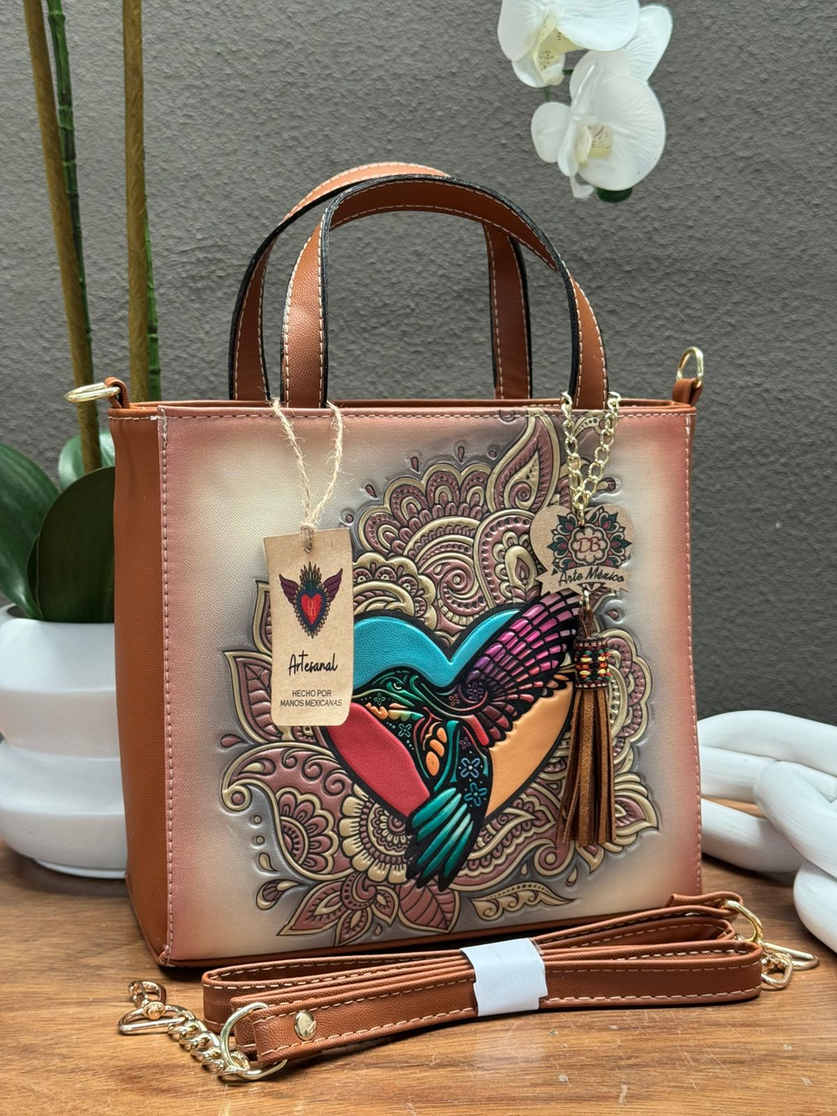 DB JULIA COLIBRI HUESO