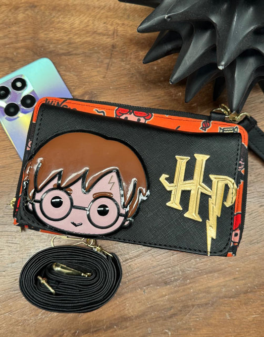 PORTACELULAR PERSONAJES HARRY POTTER NEGRO/NARANJA