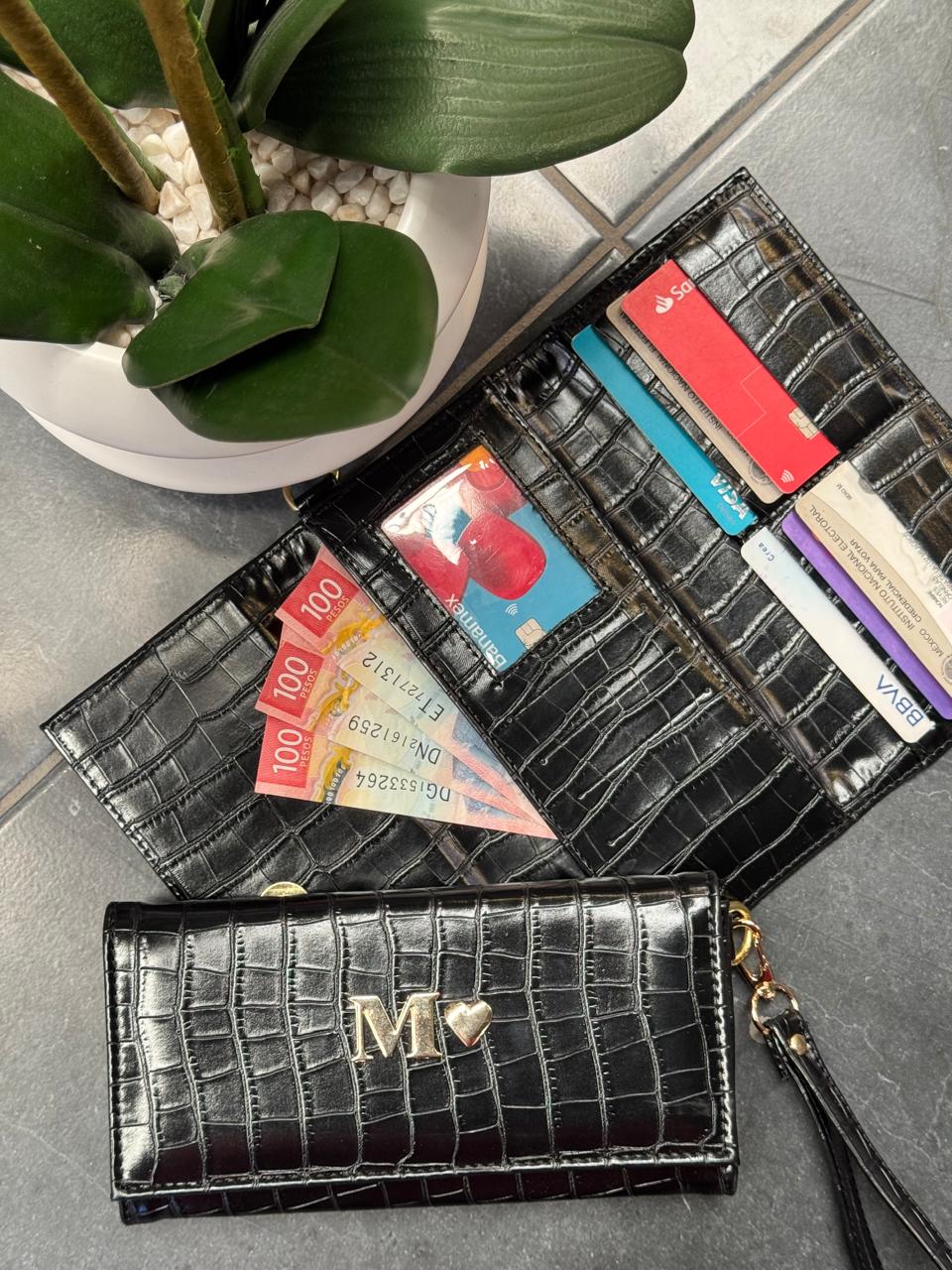 CARTERA MUÑEQUERA NEGRO DRILO
