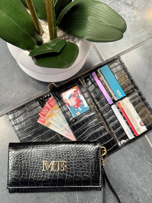 CARTERA MUÑEQUERA NEGRO ALIGATOR