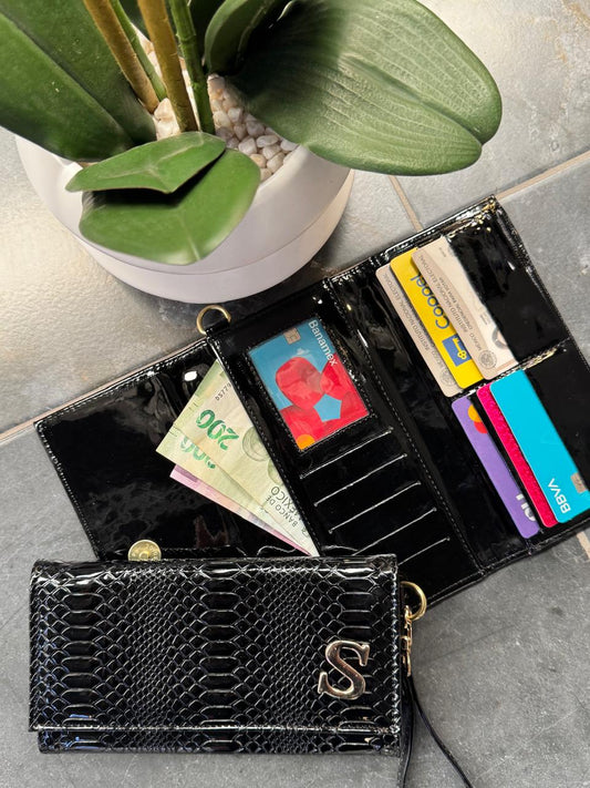 CARTERA MUÑEQUERA VIBORA NEGRO CHAROL