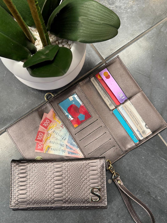 CARTERA MUÑEQUERA VIBORA METAL ACERO