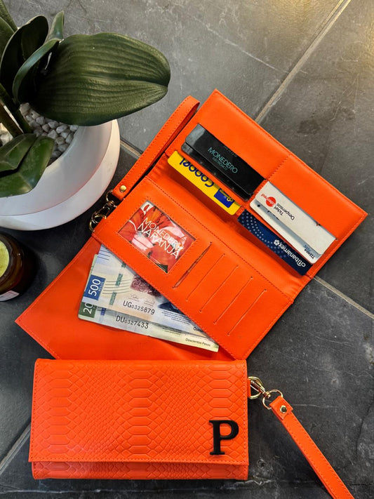 CARTERA MUÑEQUERA VIBORA NARANJA