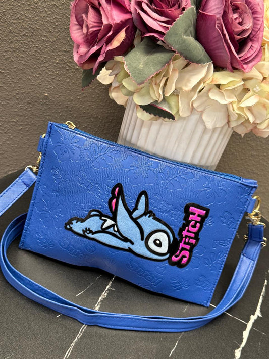 CROSSBODY/MUÑEQUERA DISNEY STITCH ACOSTADO