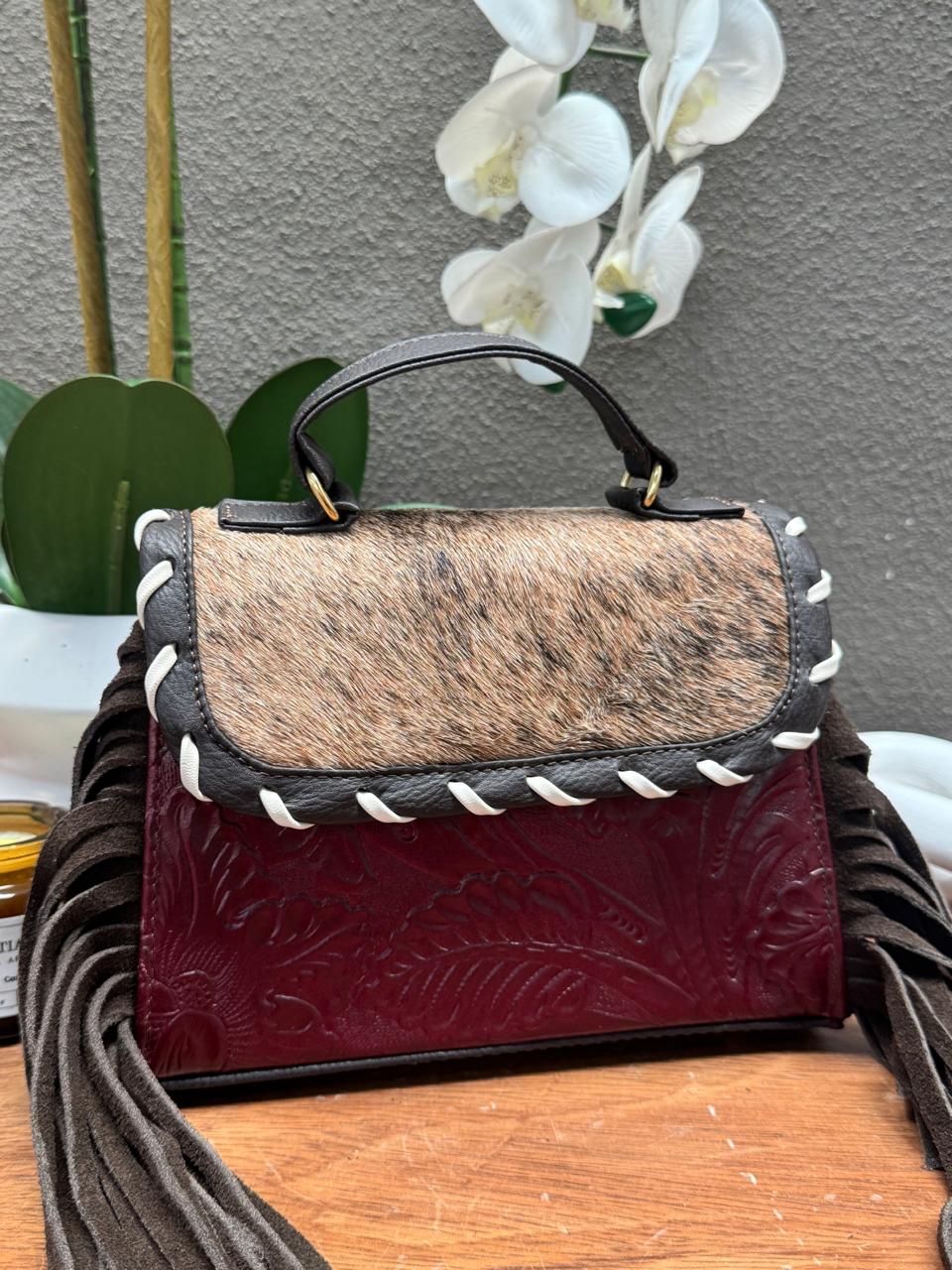 CROSSBODY FABIOLA PELO Y BARBAS VARIABLE PIEL VINO