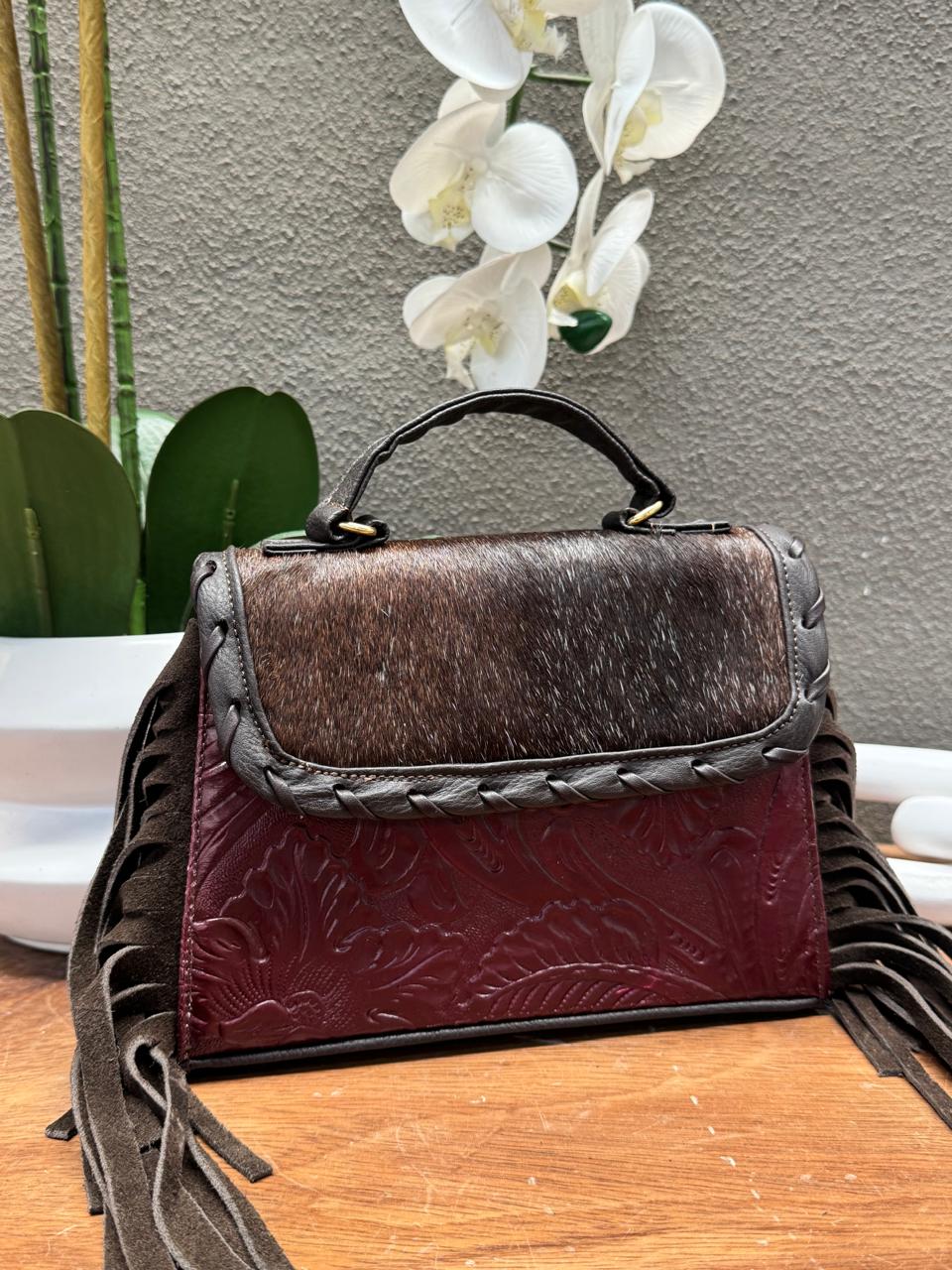 CROSSBODY FABIOLA PELO Y BARBAS VARIABLE PIEL VINO