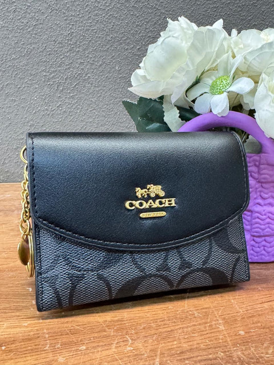 MONEDERO COACH NEGRO
