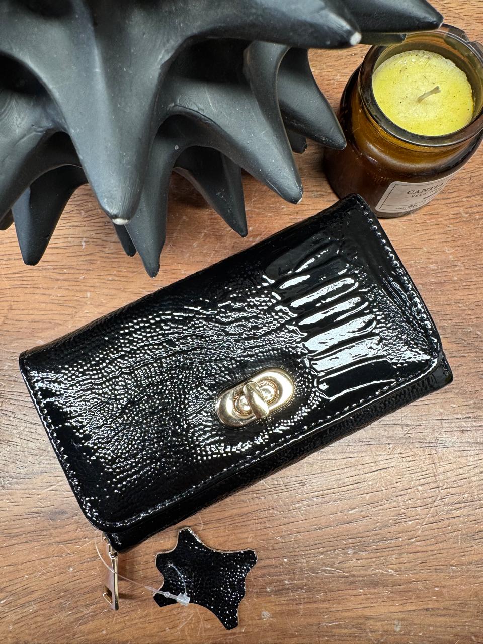CARTERA PORTUGAL BROCHE 100% PIEL NEGRO PATA DE AVESTRUZ