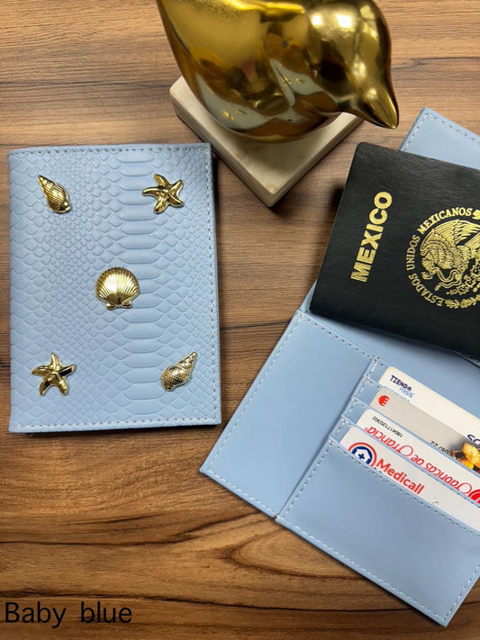 PORTAPASAPORTE IND. BABY BLUE