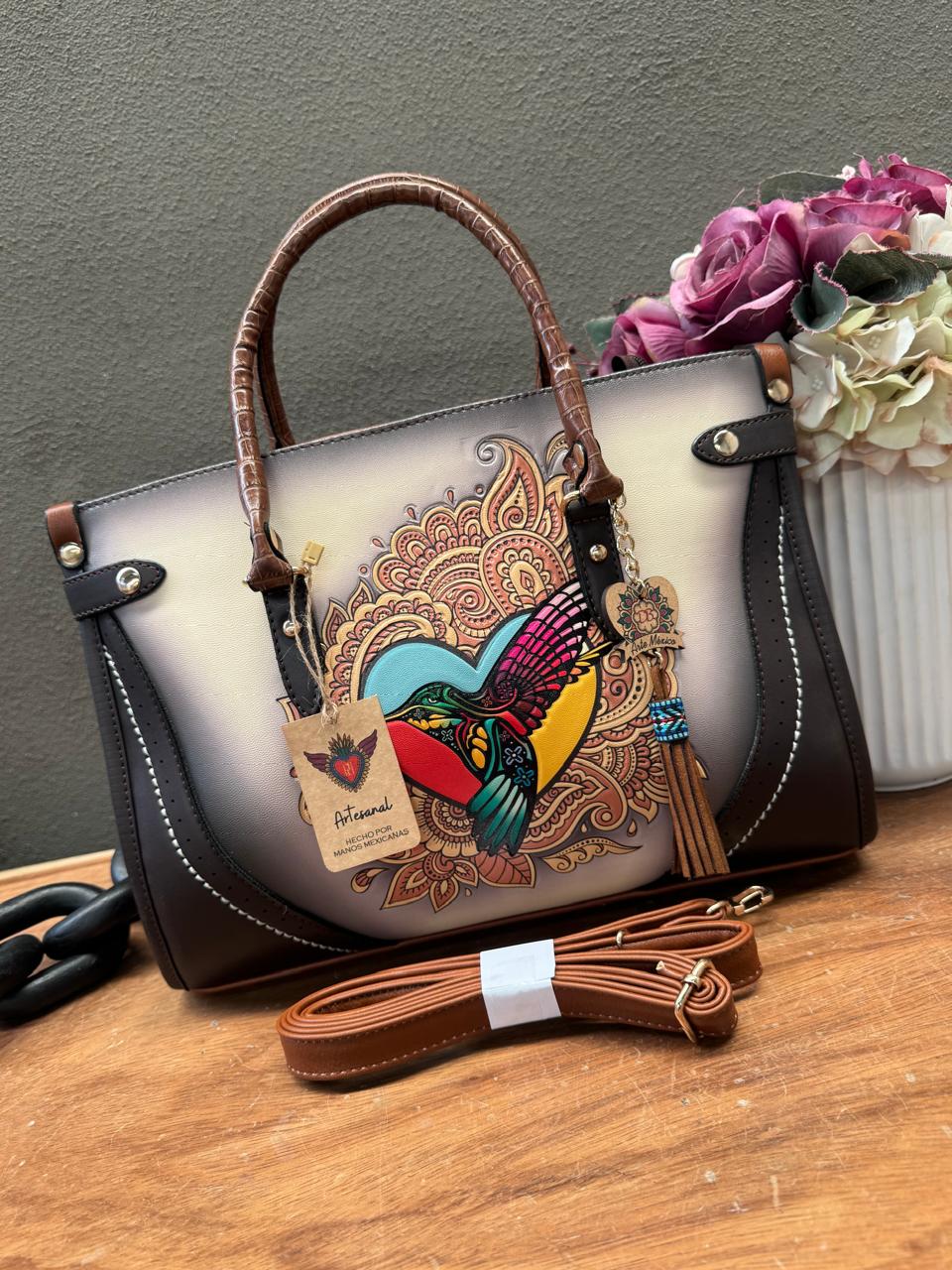 DB GDE JENIFER COLIBRI HUESO