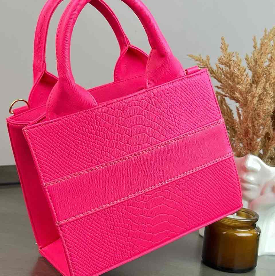 TOTE CLASICA MINI ROSA NEON