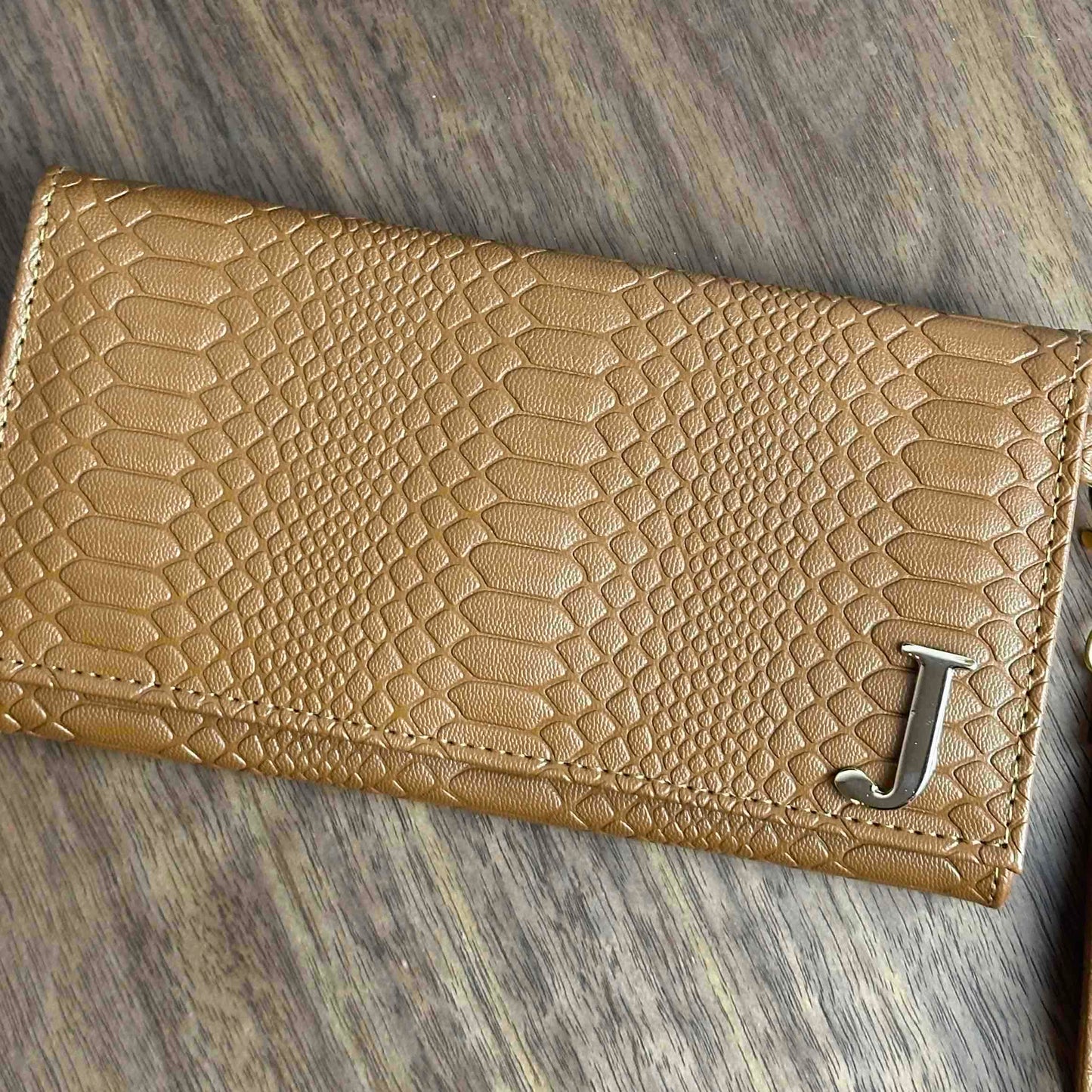 CARTERA MUÑEQUERA CAMEL