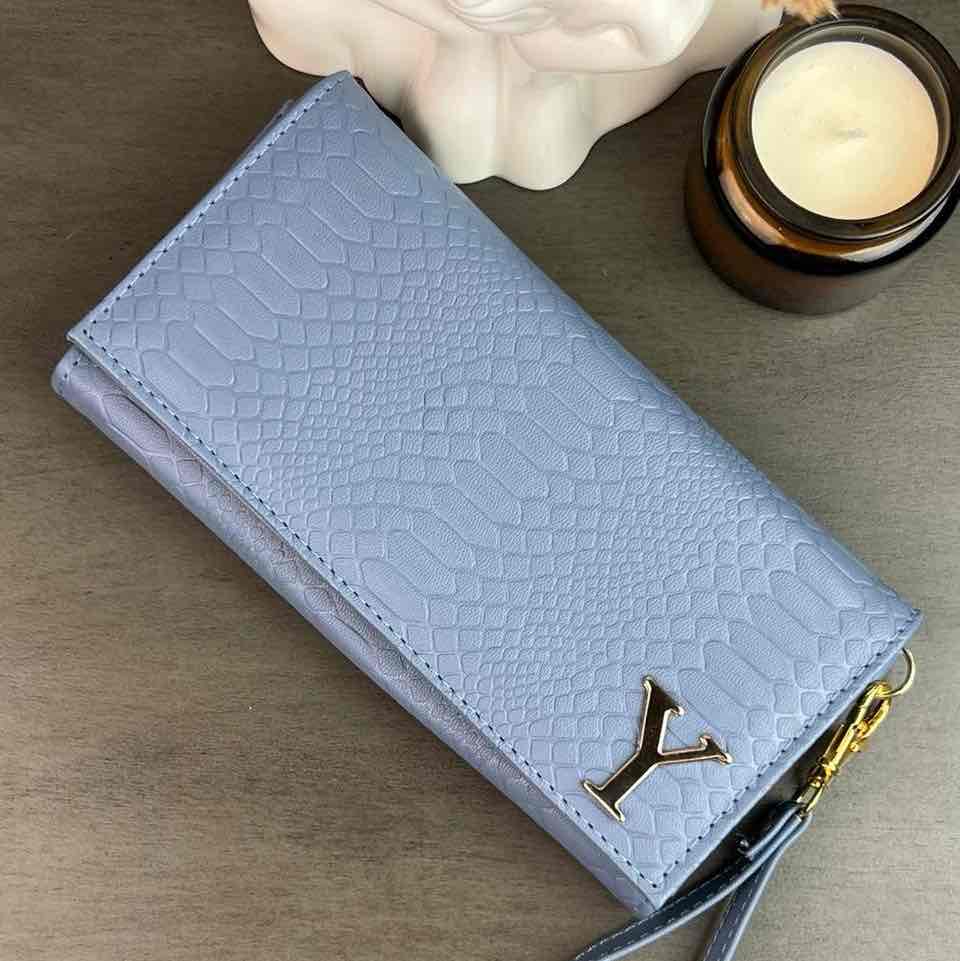 CARTERA MUÑEQUERA VIBORA AZUL MEZCLILLAA